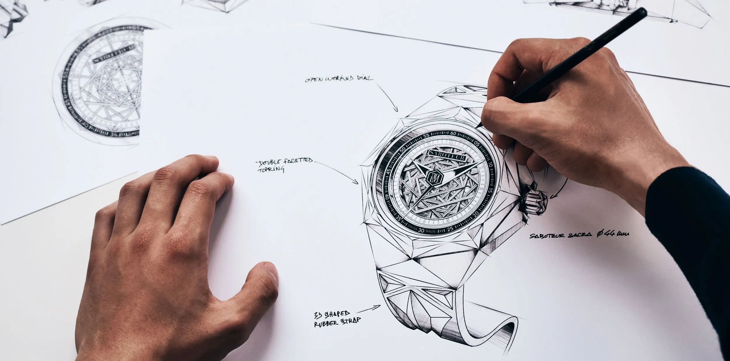 Watch designer's hands sketching a faceted skeleton watch in pencil — ACTE.5 watch design studio