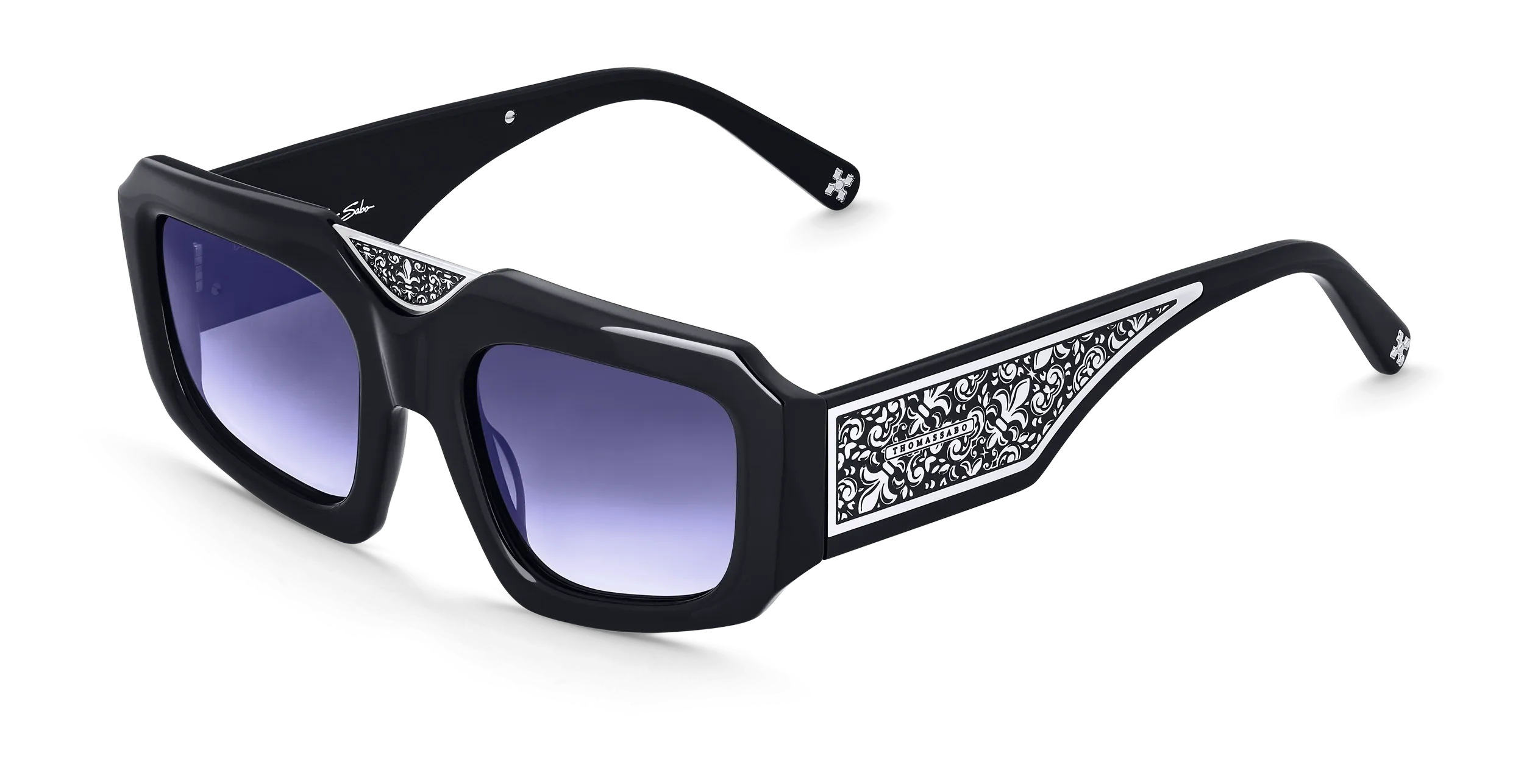 Sunglasses with purple gradient lenses and an engraved floral pattern on the temples